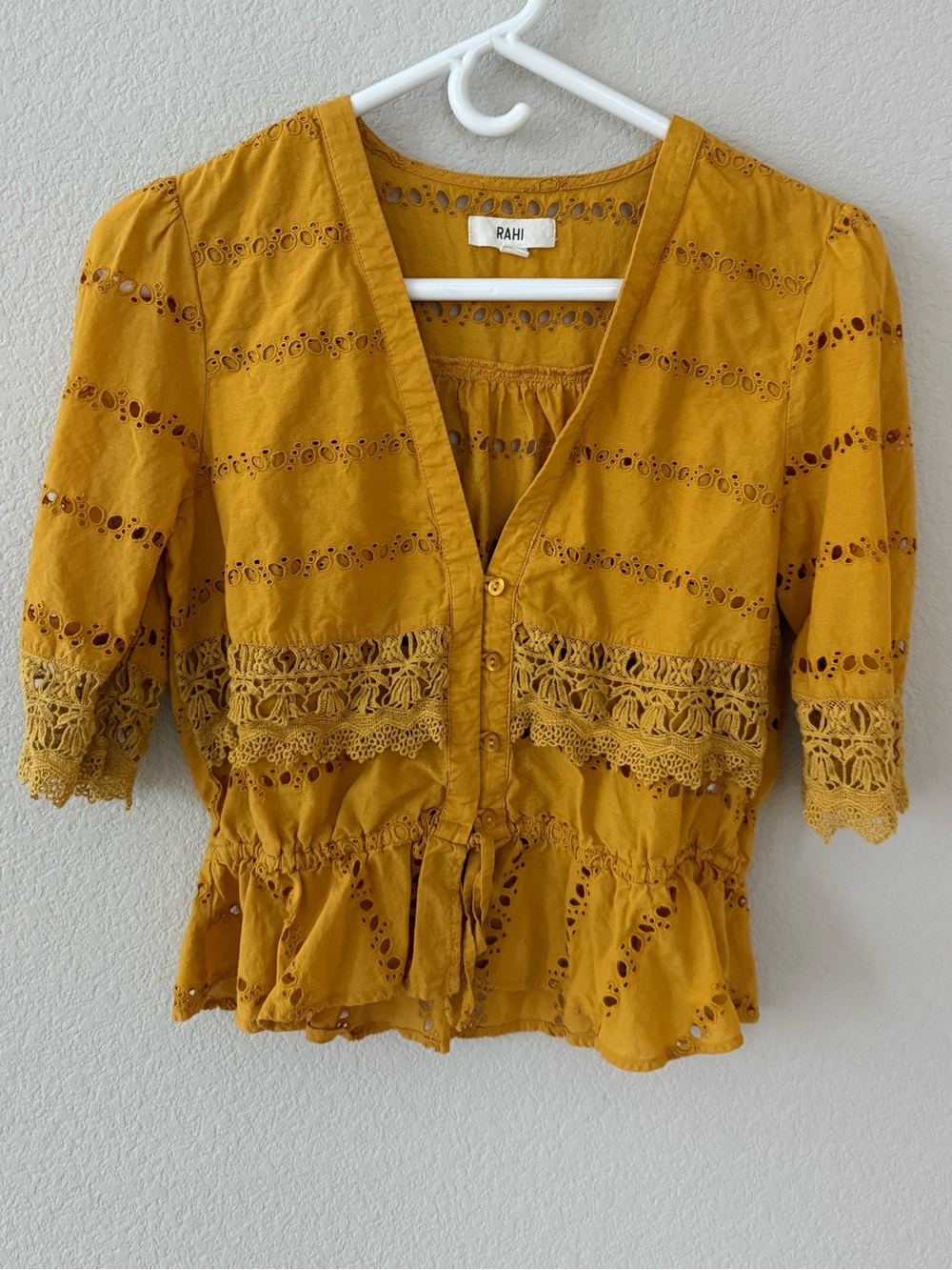 Rahi Eyelet Lace Peplum Top